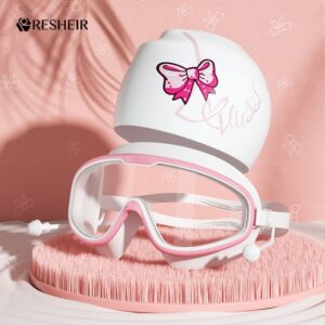 White swimming cap and goggles set